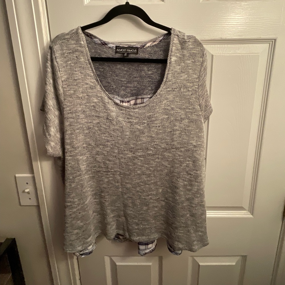 Lightweight knit sweater with plaid pattern on the back